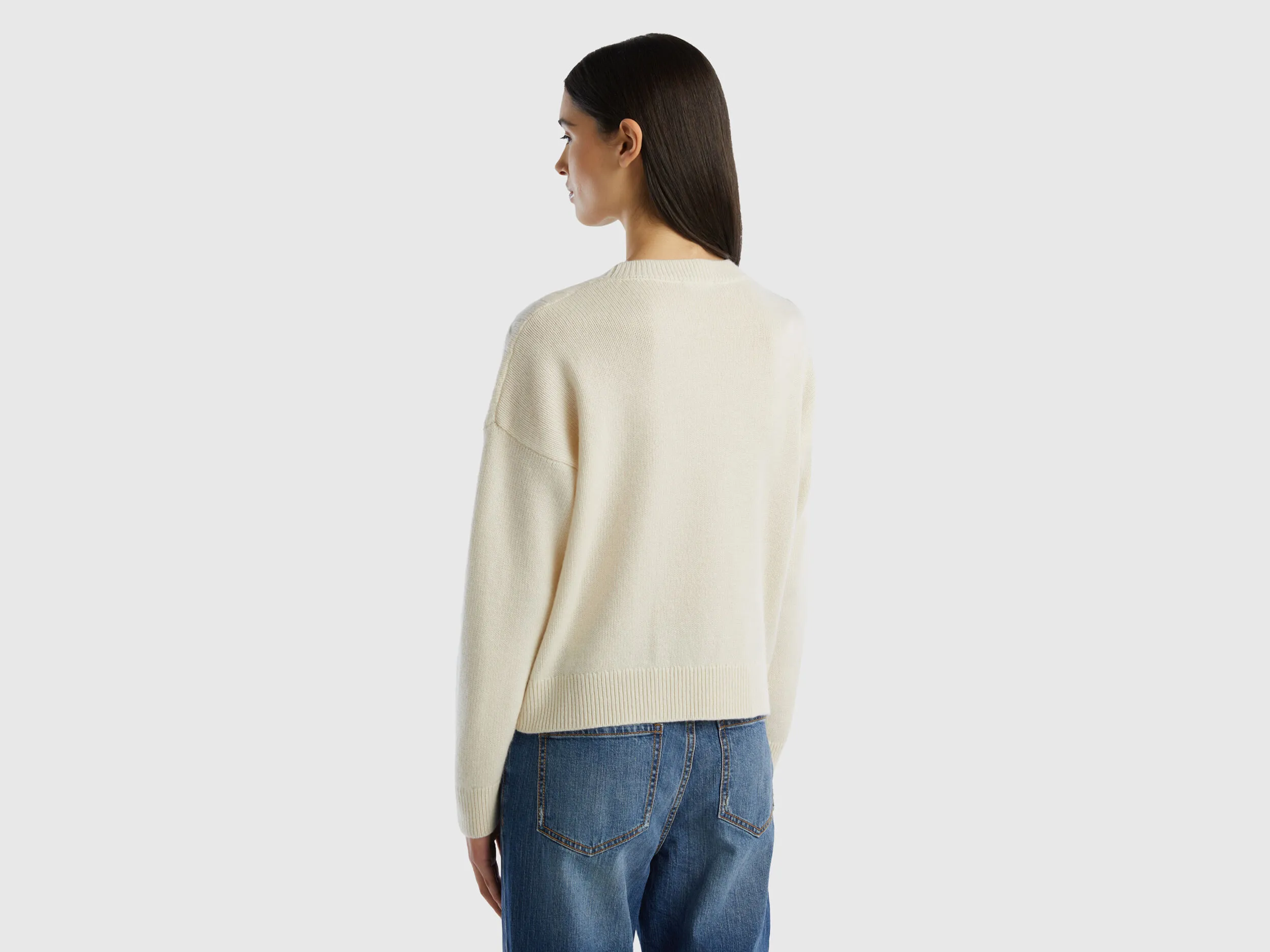 Knit sweater in pure cashmere - Creamy White | Benetton